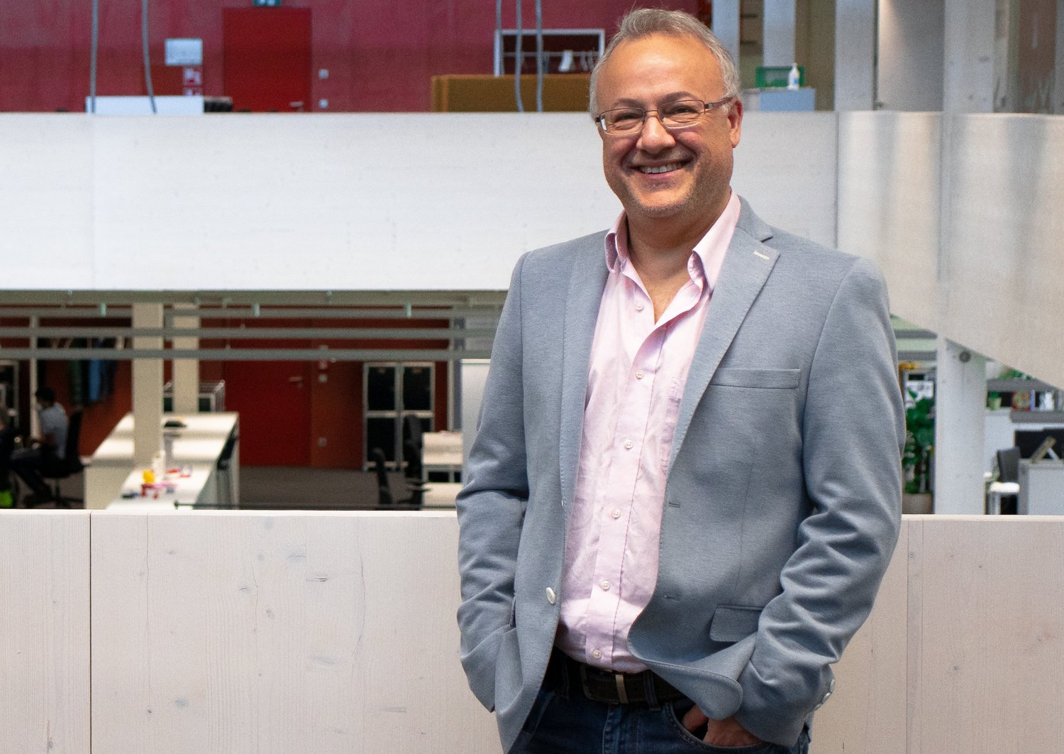 Pedro Julián stands in front of the camera and smiles