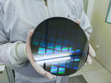 Researcher hold wafer in the lab