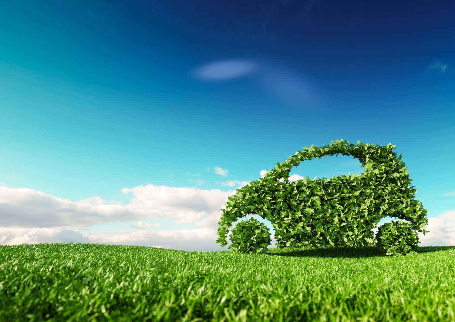 Grafische Darstellung eines Autos aus Blättern, suggeriert Nachhaltigkeit (Stock Foto)