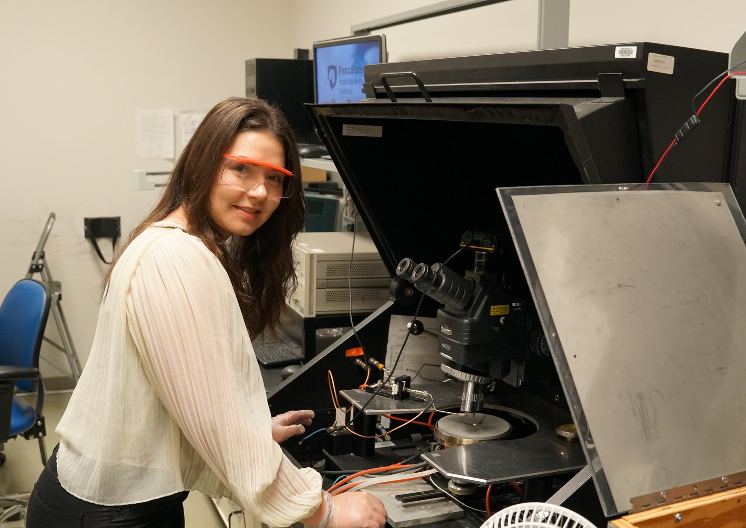 Madeleine Petschnigg working on one of the probe stations in the Susan Trolier-McKinstry research group's electrical characterization laboratory.